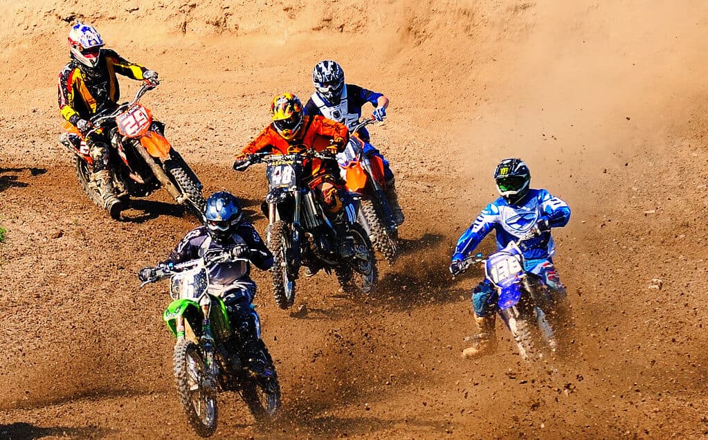 Adult rider on a dirt bike at speed